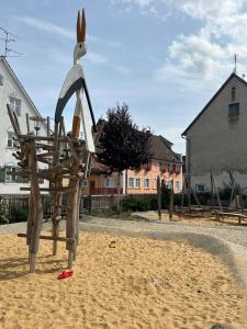 a statue of a rabbit on the beach at Anna9 - Penthouse Suite nahe Legoland Günzburg in Ichenhausen +13 photos