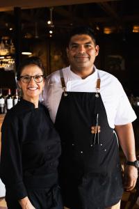 a man and a woman standing in a kitchen at Hotel Las Palmas in San Felipe +60 photos