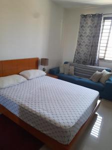 Postel nebo postele na pokoji v ubytování Conforto