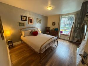 Ένα ή περισσότερα κρεβάτια σε δωμάτιο στο Great rooms in an uber cool flat! London Bridge