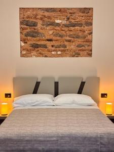 Ένα ή περισσότερα κρεβάτια σε δωμάτιο στο Casa Sarina Catania +21 φωτογραφίες