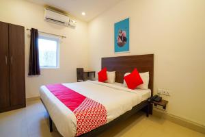 Ένα ή περισσότερα κρεβάτια σε δωμάτιο στο Hotel O by OYO Sunshine