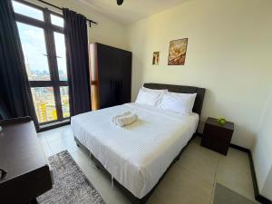 Katil atau katil-katil dalam bilik di Neu suite, Family Unit - Jelatek LRT Gleneagles Hospital