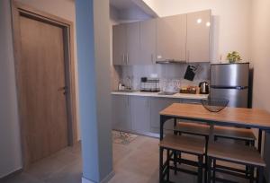 Η κουζίνα ή μικρή κουζίνα στο Vasiliki's apartment