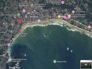 a map of the ocean with pink circles on it at Wind Villa Weligama Bay - Vacation House in Weligama