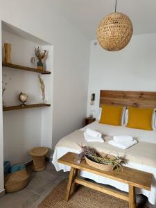 Postel nebo postele na pokoji v ubytování Casa Arbonaida