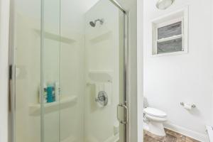 a bathroom with a shower and a toilet at Charming 1BR in Center City that Sleeps 4 with Fast WiFi in Philadelphia