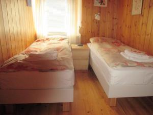 Postel nebo postele na pokoji v ubytování Grímsstaðir Guesthouse + 12 fotografií