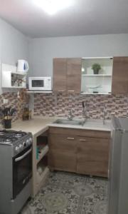 Η κουζίνα ή μικρή κουζίνα στο Casa completa, cómoda y céntrica