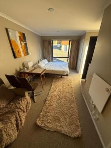 Postel nebo postele na pokoji v ubytování Private 1 br mini house