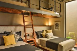 Postel nebo postele na pokoji v ubytování Hotel Criol
