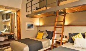 Postel nebo postele na pokoji v ubytování Hotel Criol