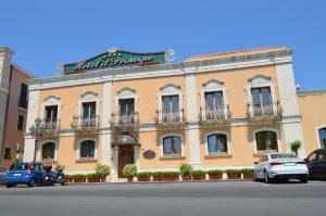 a building with a sign on the front of it at Hotel Il Principe in Milazzo