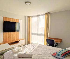 Postel nebo postele na pokoji v ubytování Hotel Florez Boutique