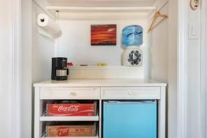 a kitchen with a cocacola counter and a drink drawer at Cozy Room with Hot Tub, Pool, Sauna & Gym Near Beach in Oceanside