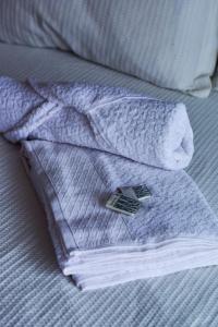 Postel nebo postele na pokoji v ubytování Duo Loft ZYZ em Frente a estacao