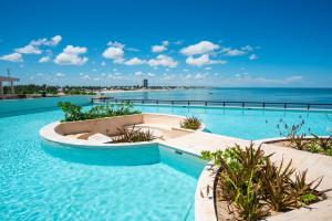 Πισίνα στο ή κοντά στο Yucalpeten Marina Coastal Elysium, breathtaking 2BR deluxe condo, stunning view