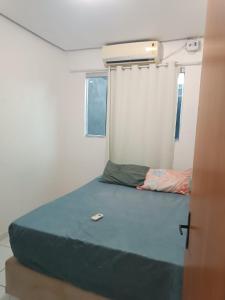 Ένα ή περισσότερα κρεβάτια σε δωμάτιο στο Casa individual São João