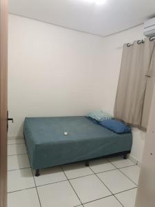 Ένα ή περισσότερα κρεβάτια σε δωμάτιο στο Casa individual São João