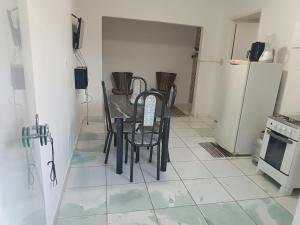 Η κουζίνα ή μικρή κουζίνα στο Casa individual São João +5 φωτογραφίες
