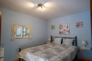 Postel nebo postele na pokoji v ubytování Casa Amarela