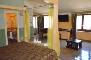 Ένα ή περισσότερα κρεβάτια σε δωμάτιο στο Hotel Il Principe