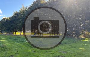 a picture of a sign in the grass at Lovely Home In Gram With Wifi in Varminglund