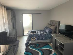 TV/trung tâm giải trí tại KingBeez Home