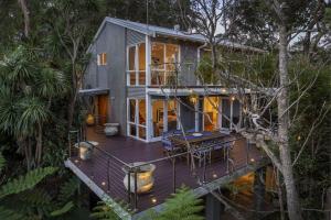 an aerial view of a house with a deck at Paraiso Del Mar - by Coast Hosting in Copacabana