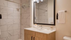 a bathroom with a sink and a shower at The Gilmore, an AvantStay Hotel in Nashville +102 photos