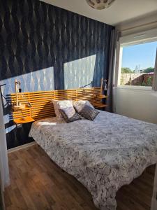 Postel nebo postele na pokoji v ubytování Maison familiale - ménage, serviettes, draps inclus