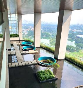 a building with four blue bowls on the floor at Azure Residences, PJ Paradigm By Kiddie Space, Kids Friendly in Petaling Jaya