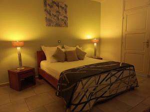 Postel nebo postele na pokoji v ubytování Villa Les Galeries de L'océan