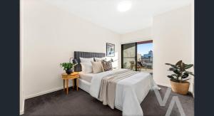 Katil atau katil-katil dalam bilik di One Bedroom Penthouse with Water Views