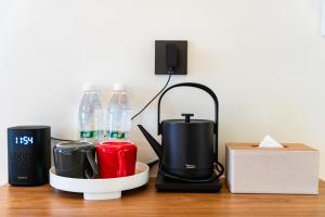 Παροχές για τσάι/καφέ στο Floral Hotel Xidi Jiuheboshe B&B