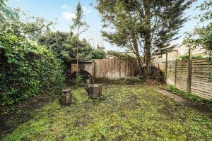 Zahrada ubytování Charming Designer Cosy Loft Apartment + 2 fotografie