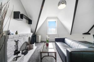 Posezení v ubytování Charming Designer Cosy Loft Apartment