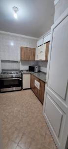 Η κουζίνα ή μικρή κουζίνα στο Jannat Madinaty