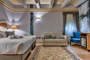 Postel nebo postele na pokoji v ubytování Palazzo Consiglia - IK Collection