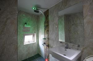 Koupelna v ubytování 6th Street Stay