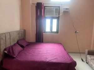 En eller flere senge i et værelse på MOON STAR HOTEl