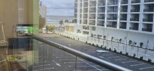 a view of a city street from a building at Luxury Apartment in Alezzi Resort Piscina Interioara & Spa in Mamaia Nord