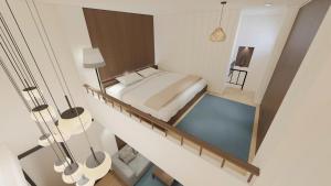 an overhead view of a bedroom with a bed at Dfour Home Ngõ Gạch, Hoan Kiem, Ha Noi Old Quarter in Hanoi