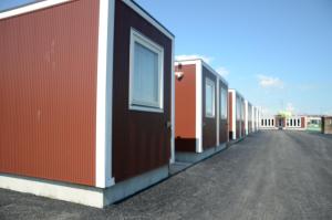 a row of houses on the side of a street at SMA MO inn Chitose in Chitose