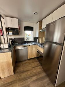 Η κουζίνα ή μικρή κουζίνα στο Mobilhome L'Instant Chill au Cap Ferret