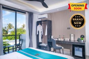 Ένα ή περισσότερα κρεβάτια σε δωμάτιο στο Sunwave Dhigurah