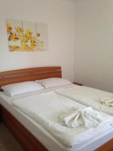 Postel nebo postele na pokoji v ubytování Mellys Haus
