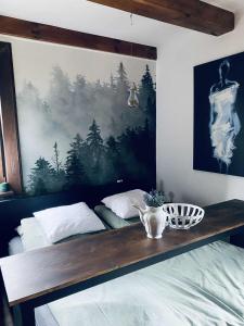 a bedroom with a wooden shelf above a bed at Magnusowe Siedlisko in Budy Chojnackie +61 photos