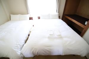 Una cama o camas en una habitación de Post Hotel apartment