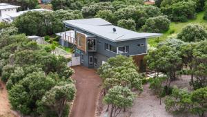 an aerial view of a house in the forest at Seabreeze Escape, Coastal Stay in Gnarabup